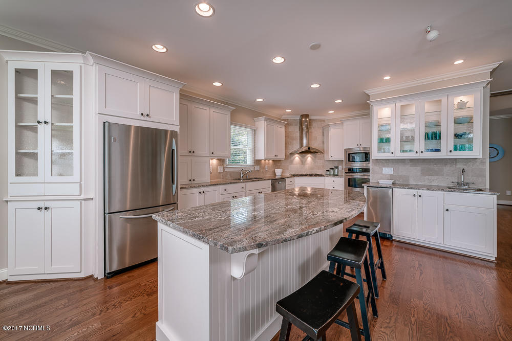 218 Sea Isle Point Atlantic Beach, NC 28512 - Photo 12 of 54 With Breakfast Bar and Wet Bar