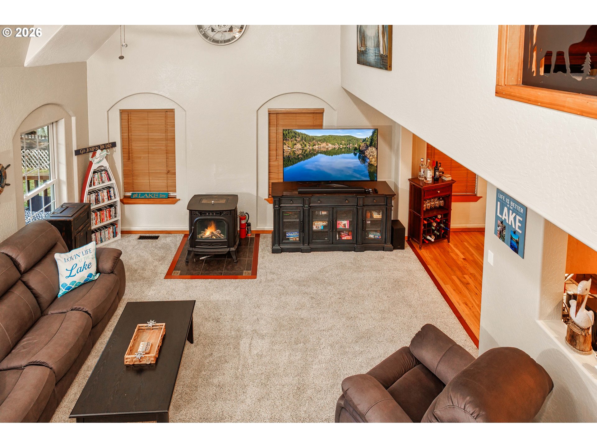 71381 Fishhawk Road Birkenfeld, OR 97016 - Photo 12 of 26 a living room with furniture and a flat screen tv