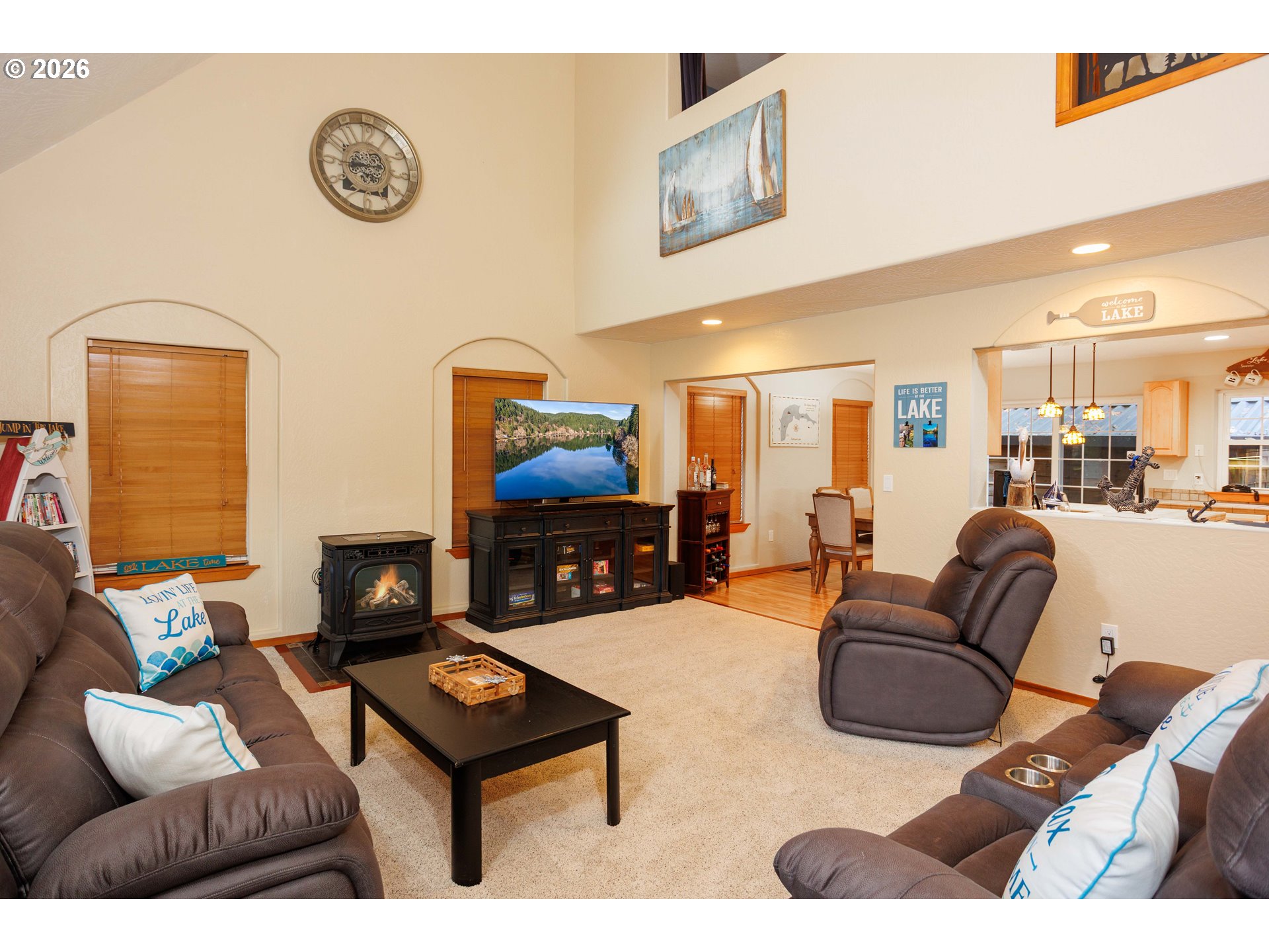 71381 Fishhawk Road Birkenfeld, OR 97016 - Photo 4 of 26 a living room with furniture and a flat screen tv