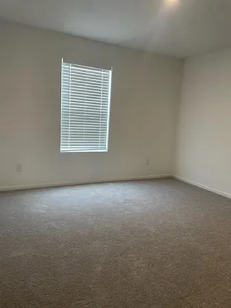 an empty room with a window