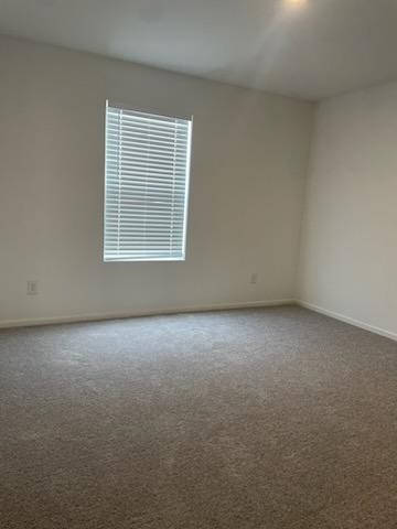 275 Lisa Marie Drive Angleton, TX 77515 - Photo 14 of 21 an empty room with a window