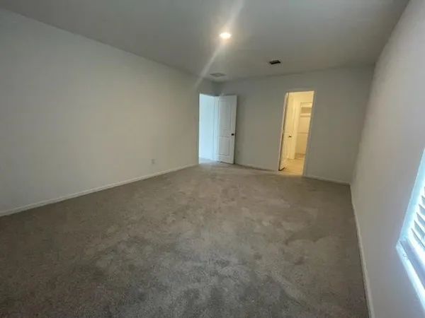 an empty room with windows