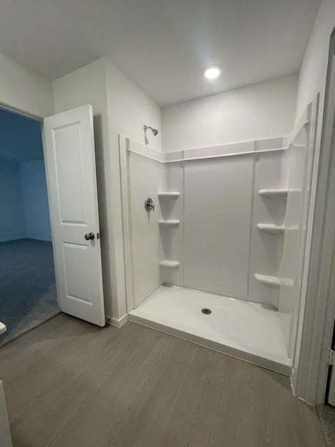 275 Lisa Marie Drive Angleton, TX 77515 - Photo 10 of 21 a bathroom with a glass shower door