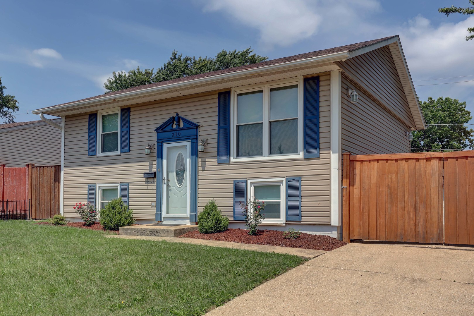 310 Healy Avenue Romeoville, IL 60446 - Photo 1 of 1 front view of a house with a yard