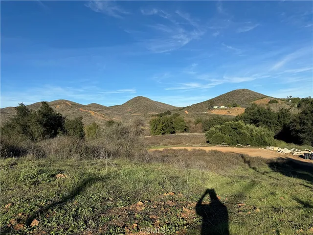 a view of a mountain with a outdoor space