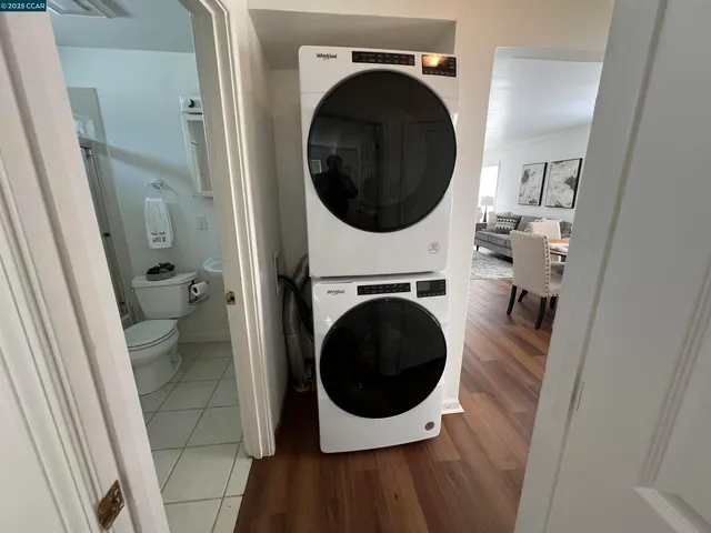 a view of a hallway with washer and dryer