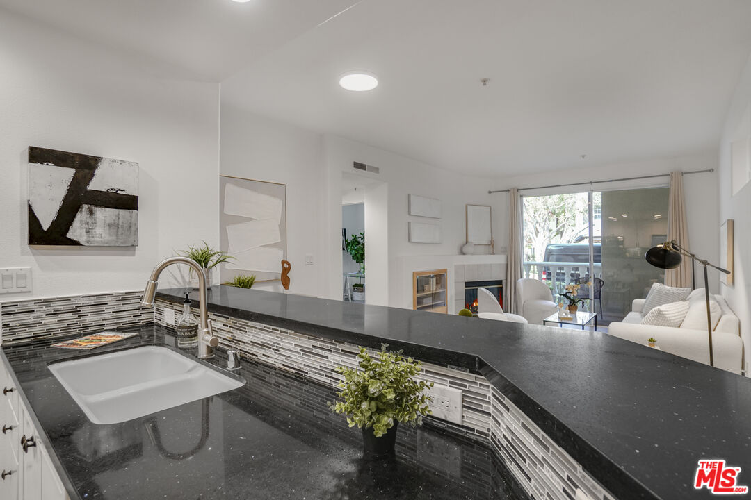 12963 West Runway Road, Unit 121 Playa Vista, CA 90094 - Photo 14 of 46 a view of living room with furniture and flat screen tv