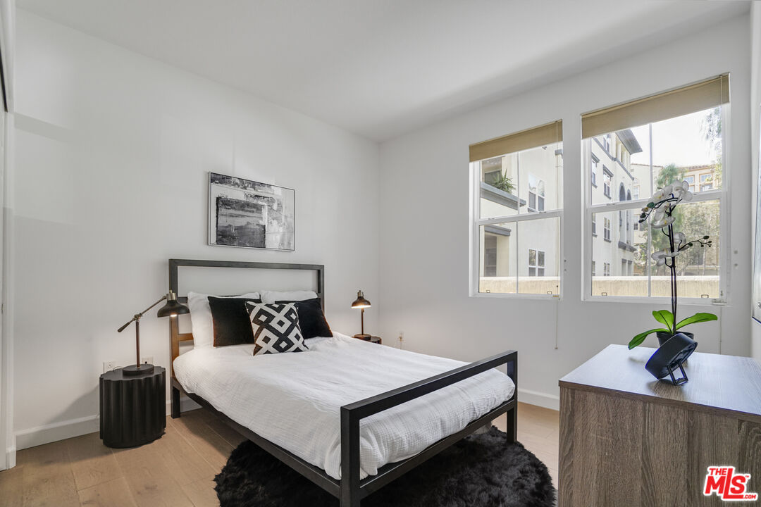 12963 West Runway Road, Unit 121 Playa Vista, CA 90094 - Photo 21 of 46 a bedroom with a bed and a window