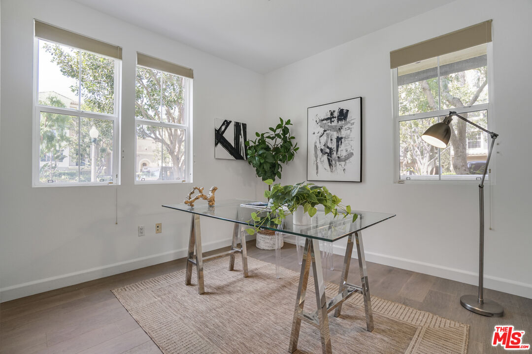 12963 West Runway Road, Unit 121 Playa Vista, CA 90094 - Photo 23 of 46 a view of a workspace with furniture and a window