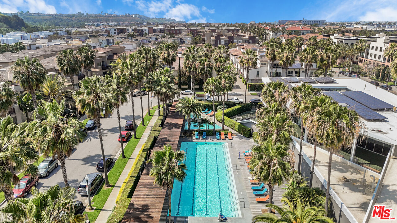 12963 West Runway Road, Unit 121 Playa Vista, CA 90094 - Photo 31 of 46 a view of a houses with a yard