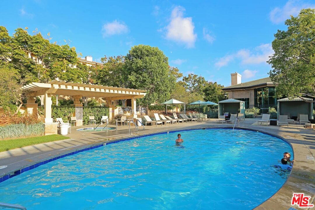 12963 West Runway Road, Unit 121 Playa Vista, CA 90094 - Photo 40 of 46 a view of a swimming pool with a patio
