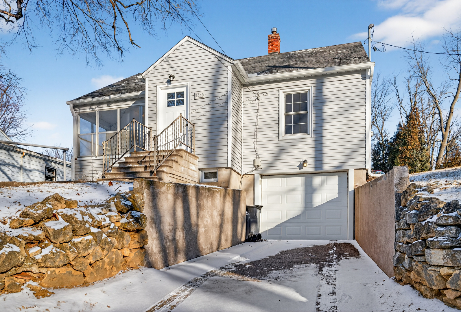 1336 Florence Avenue Clinton, IA 52732 - Photo 2 of 17 a view of a house with a patio