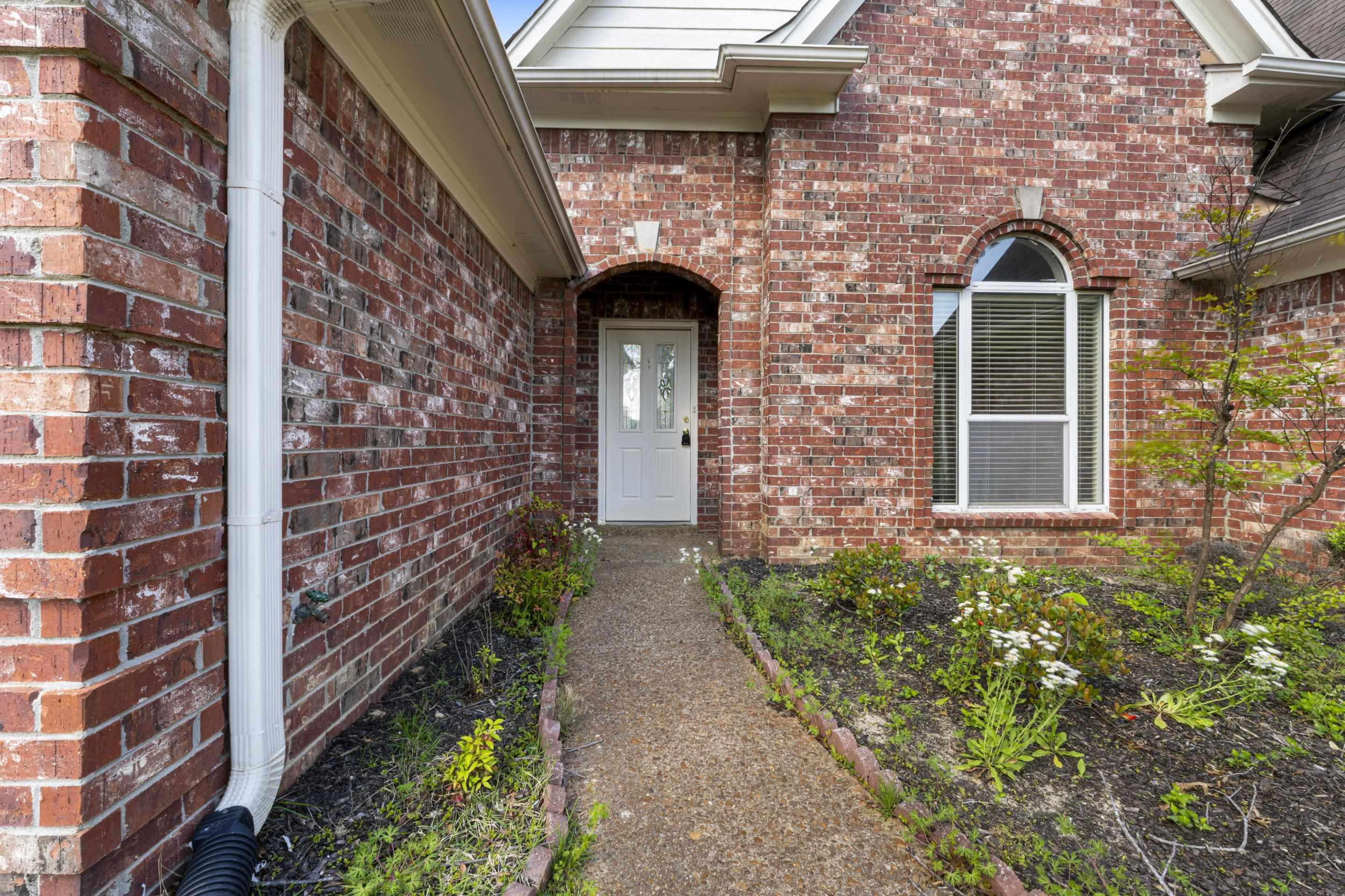 1104 Macon Hall Road Cordova, TN 38018 - Photo 32 of 34 Entrance to property featuring brick siding