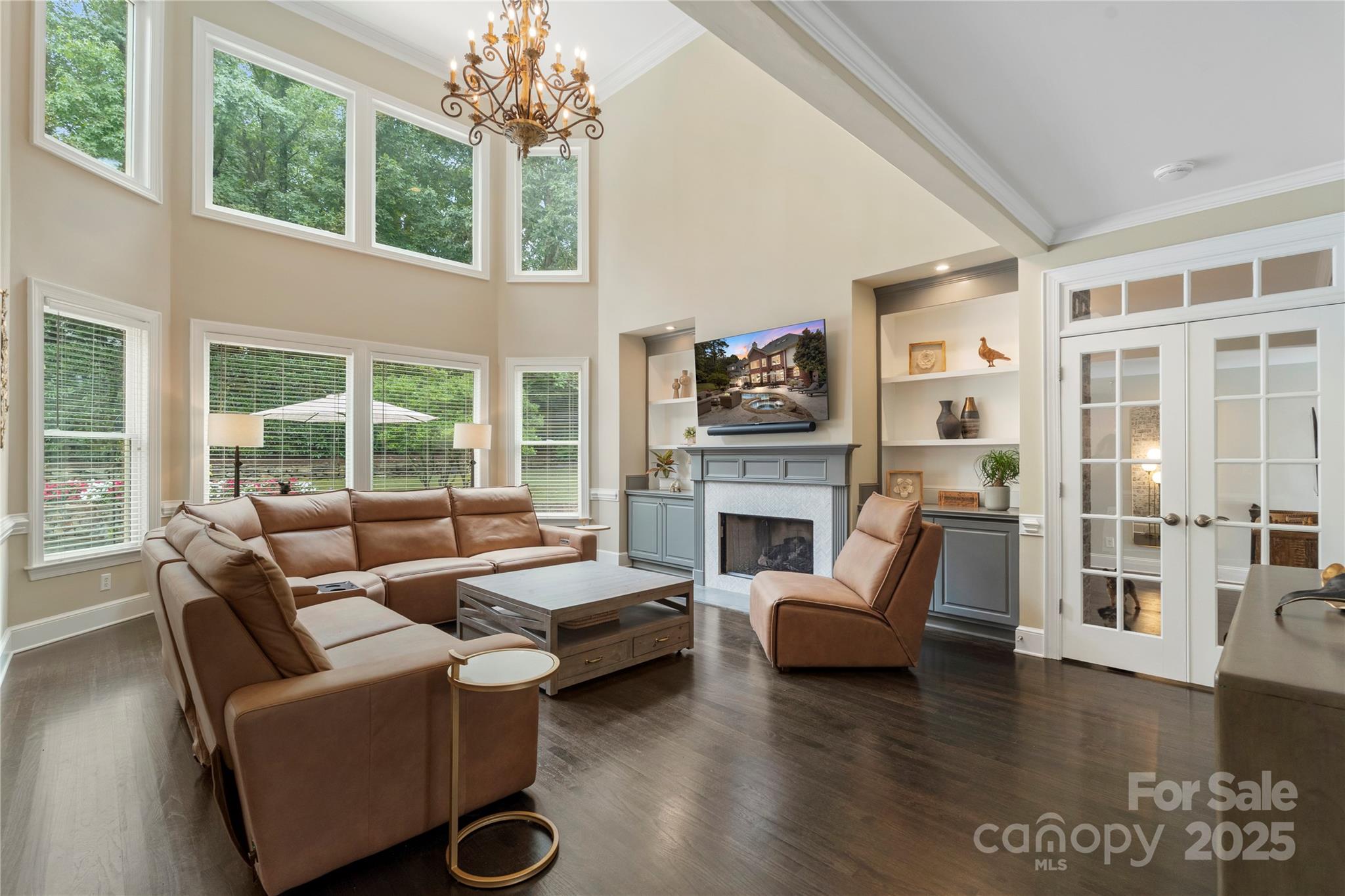 14654 Trading Path Way Charlotte, NC 28277 - Photo 11 of 48 a living room with furniture a fireplace and a large window