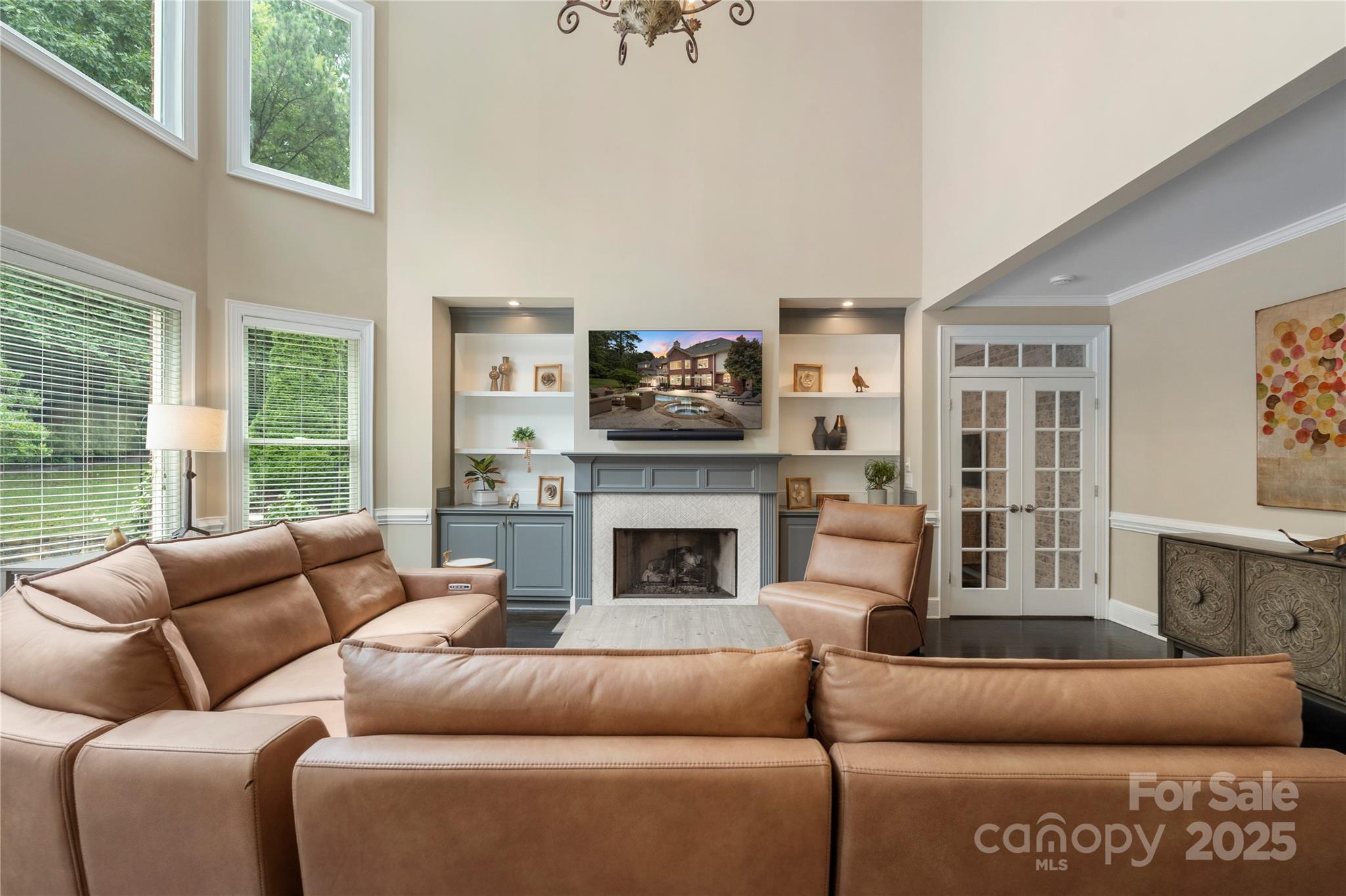14654 Trading Path Way Charlotte, NC 28277 - Photo 12 of 48 a living room with furniture a flat screen tv and a fireplace