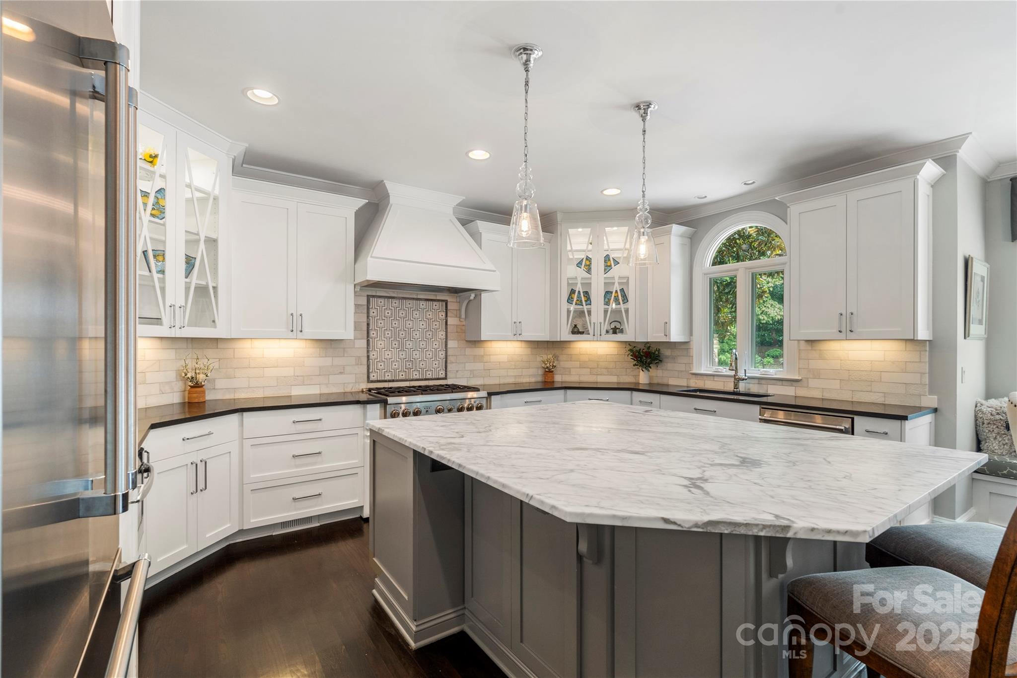 14654 Trading Path Way Charlotte, NC 28277 - Photo 15 of 48 a kitchen with granite countertop a sink a center island stainless steel appliances and cabinets