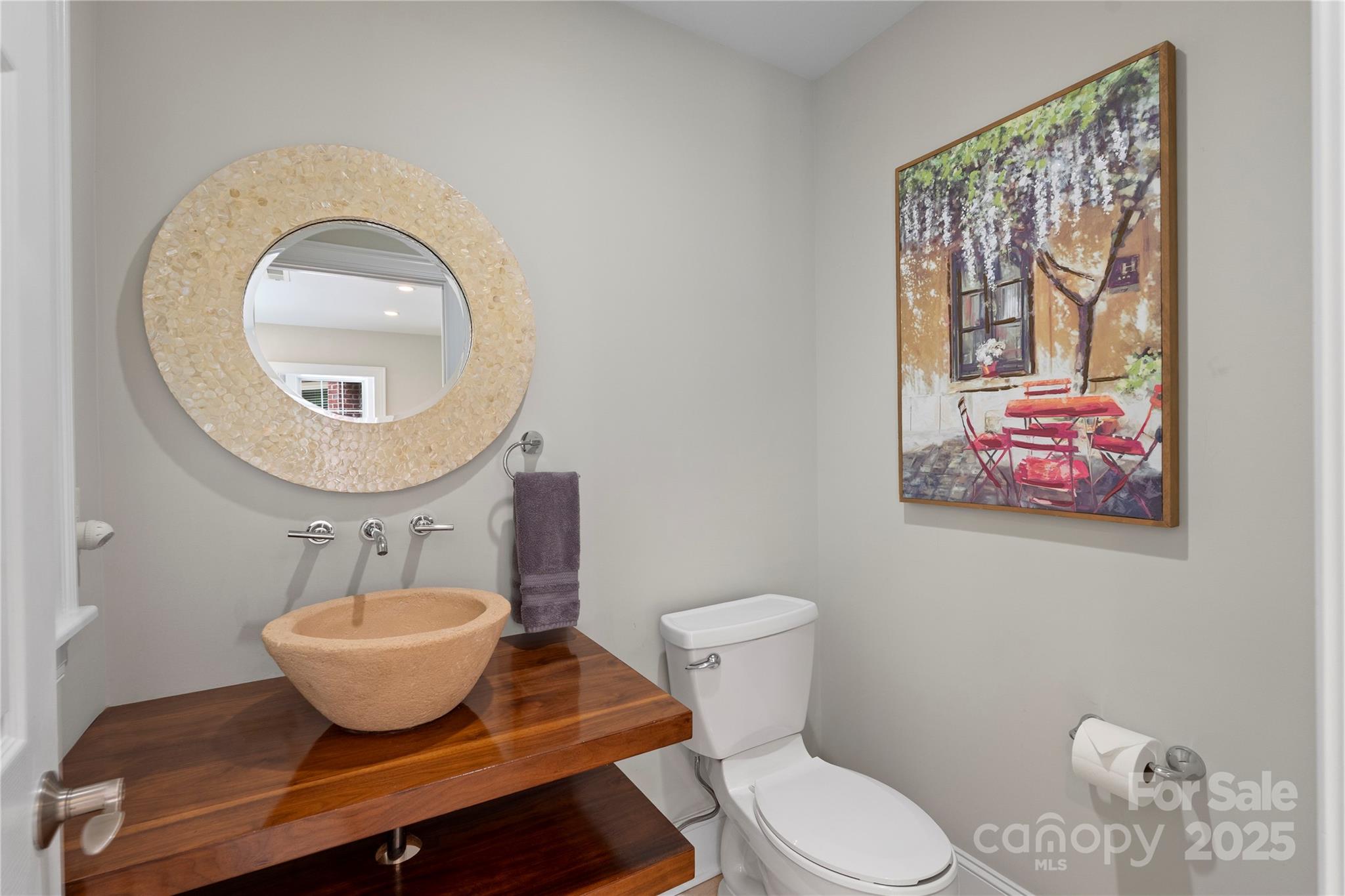 14654 Trading Path Way Charlotte, NC 28277 - Photo 24 of 48 a bathroom with a toilet a sink and mirror
