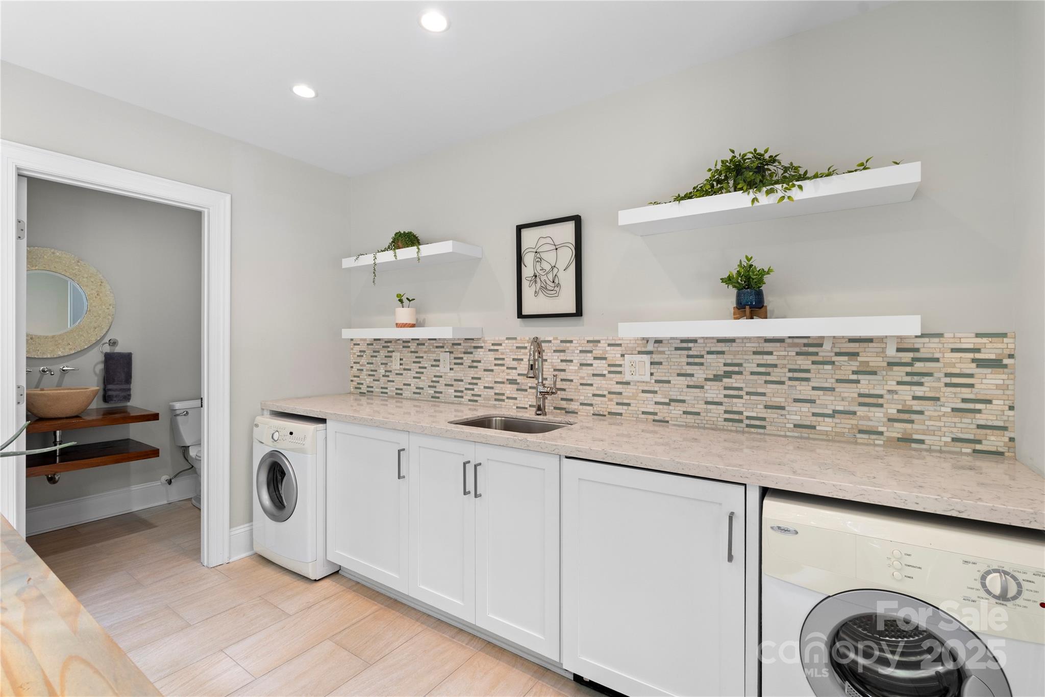 14654 Trading Path Way Charlotte, NC 28277 - Photo 25 of 48 a spacious bathroom with a sink and a mirror