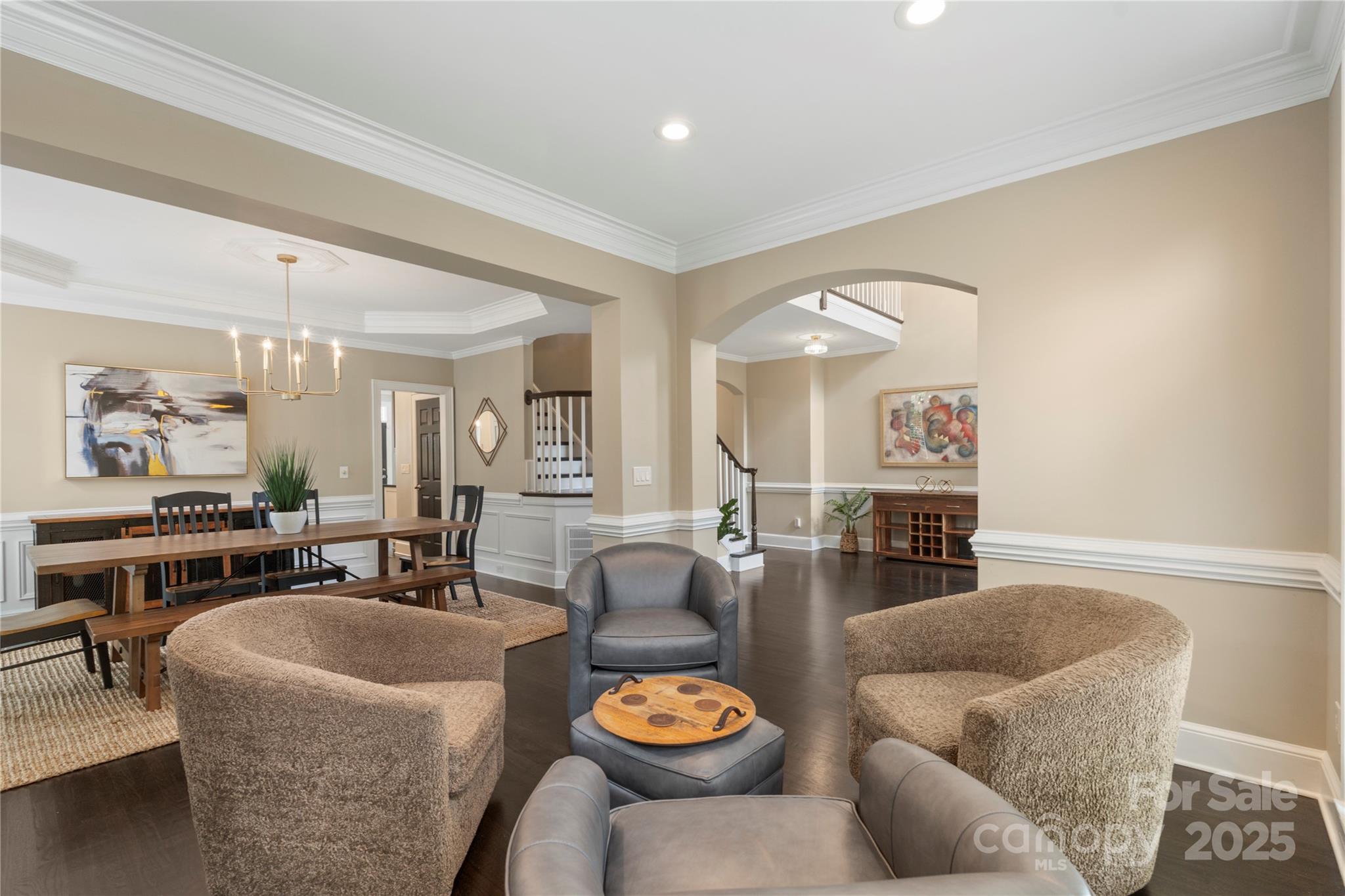14654 Trading Path Way Charlotte, NC 28277 - Photo 8 of 48 a living room with furniture and chandelier