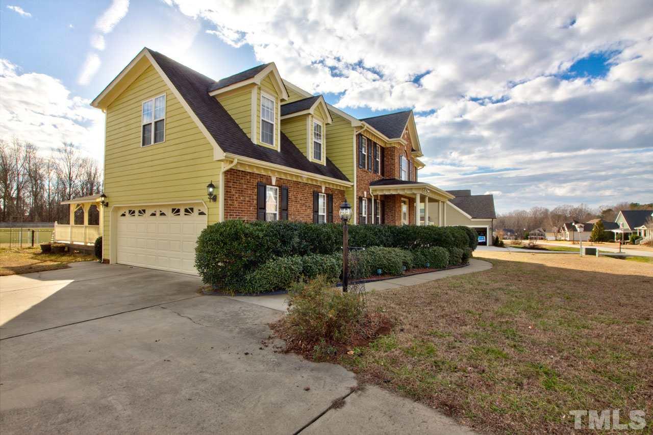 1021 Newburgh Circle Raleigh, NC 27603 - Photo 2 of 25 a view of a house with a yard