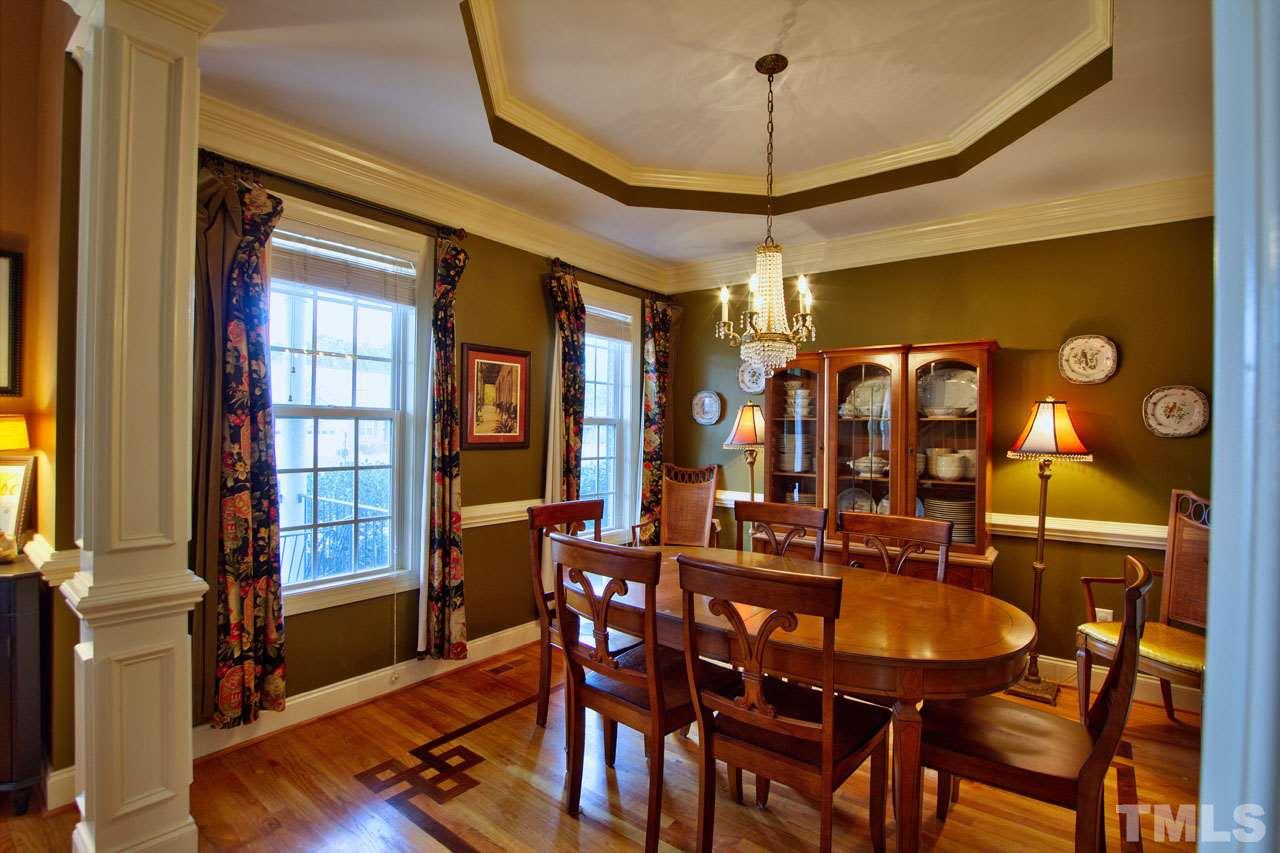 1021 Newburgh Circle Raleigh, NC 27603 - Photo 11 of 25 a view of a dining room with furniture window and wooden floor