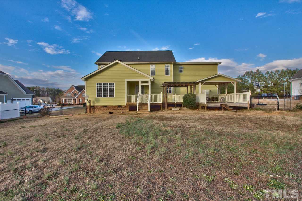 1021 Newburgh Circle Raleigh, NC 27603 - Photo 25 of 25 a front view of a house with a yard