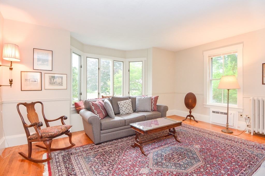 37 Pemberton Road Wayland, MA 01778 - Photo 11 of 34 a living room with furniture and a large window