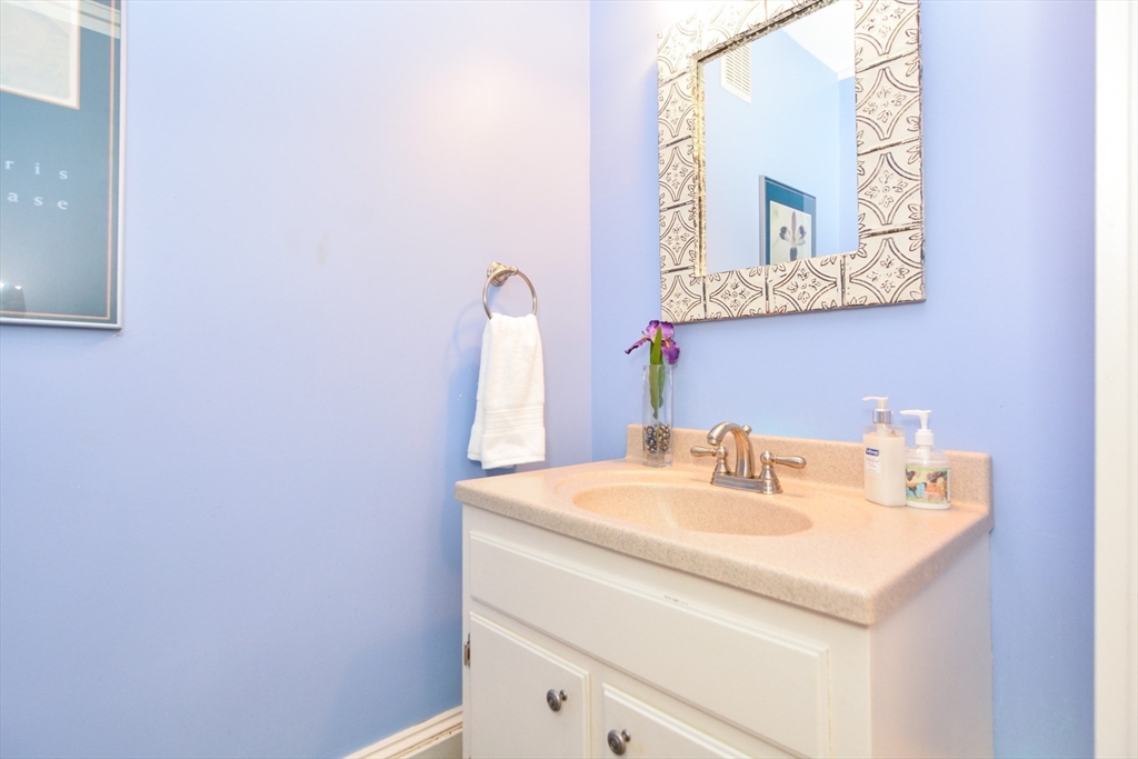 37 Pemberton Road Wayland, MA 01778 - Photo 14 of 34 a bathroom with a sink and a mirror