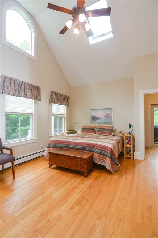 37 Pemberton Road Wayland, MA 01778 - Photo 18 of 34 a bedroom with a bed and wooden floor