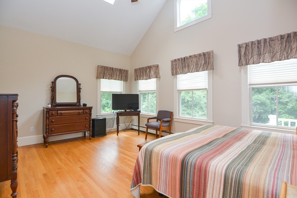 37 Pemberton Road Wayland, MA 01778 - Photo 19 of 34 a bedroom with furniture and a window