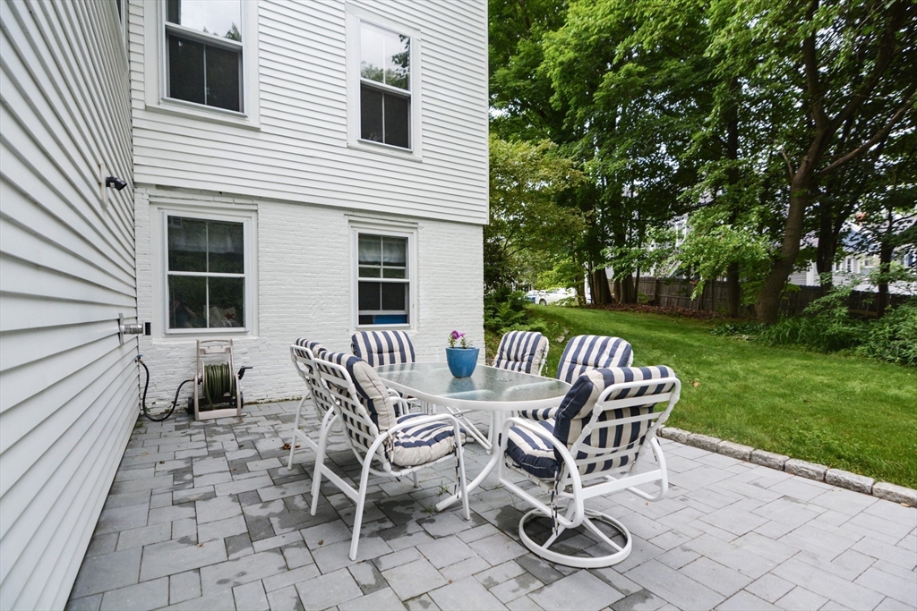 37 Pemberton Road Wayland, MA 01778 - Photo 32 of 34 a view of a patio with a yard