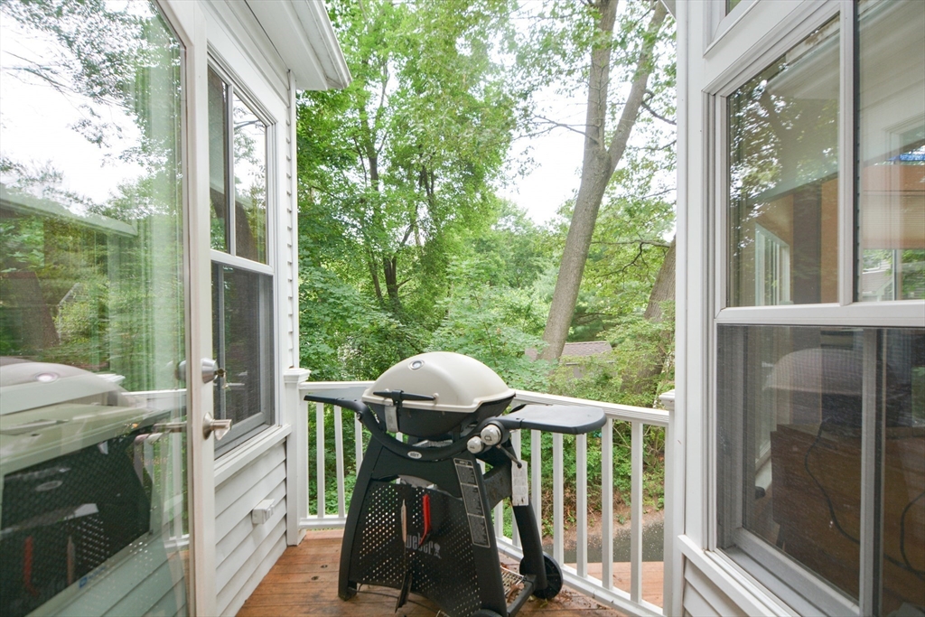 37 Pemberton Road Wayland, MA 01778 - Photo 10 of 34 a view of a balcony with furniture and backyard