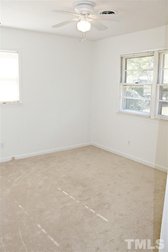 6922 Innesbrook Way Bahama, NC 27503 - Photo 3 of 11 an empty room with a window