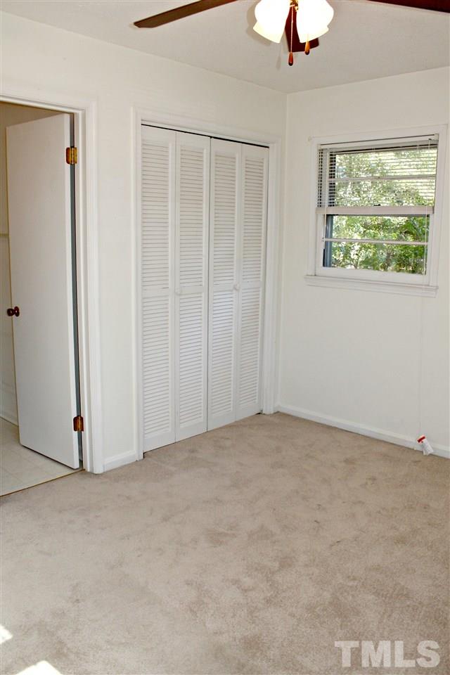 6922 Innesbrook Way Bahama, NC 27503 - Photo 8 of 11 a view of an empty room with a window