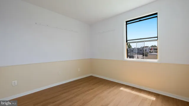 a kitchen with stainless steel appliances a refrigerator and a stove top oven