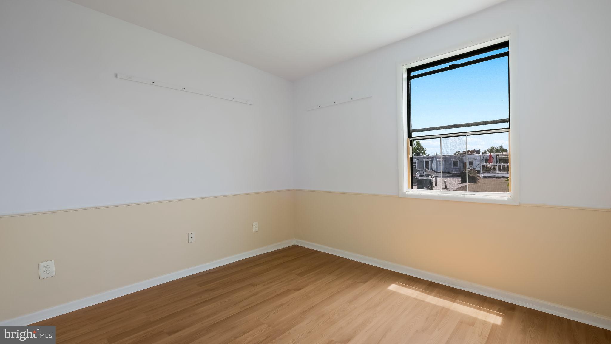 2120 South Street, Unit 2RE Philadelphia, PA 19146 - Photo 12 of 20 an empty room with a window