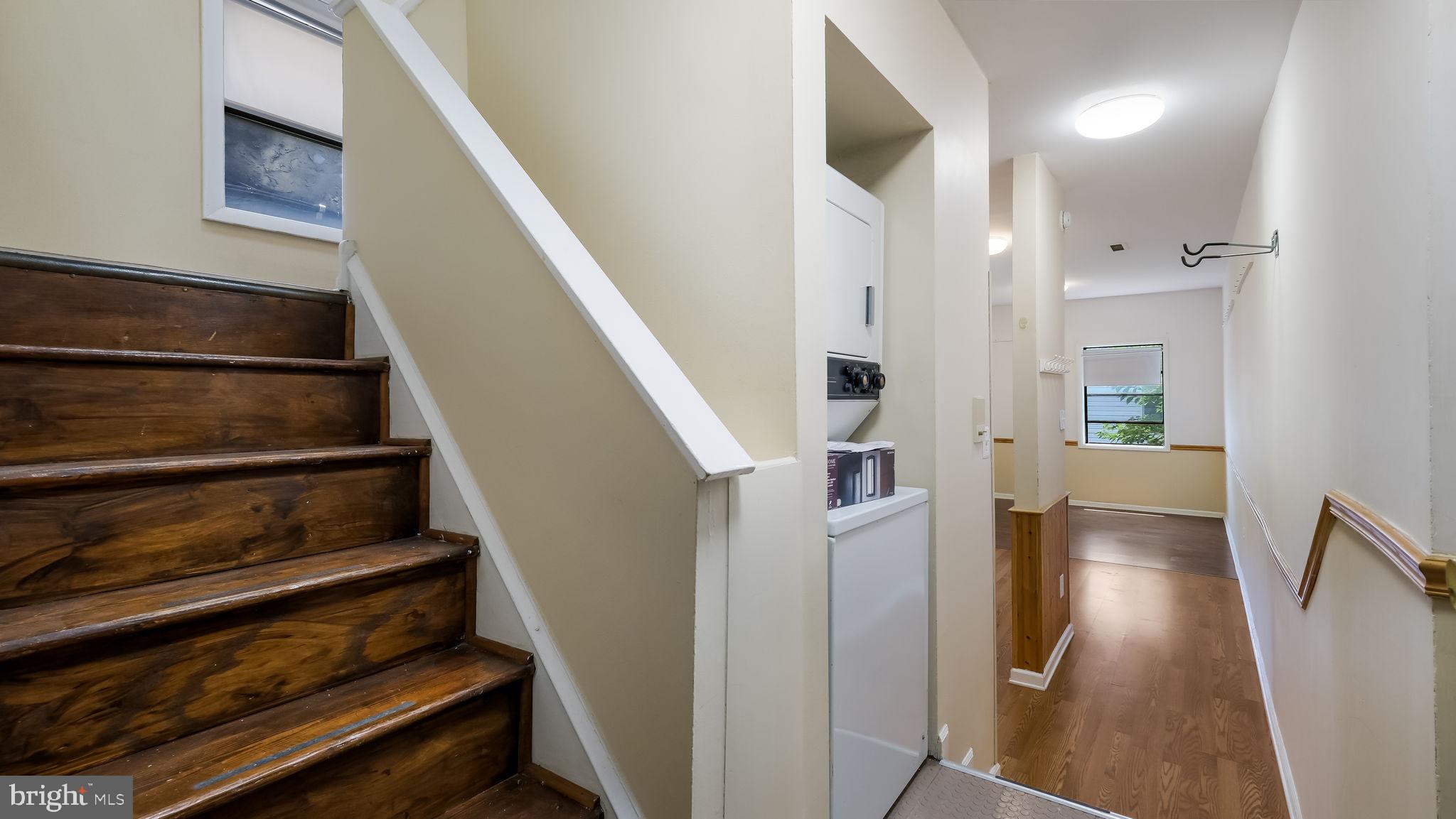 2120 South Street, Unit 2RE Philadelphia, PA 19146 - Photo 3 of 20 a view of entryway and hall with wooden floor