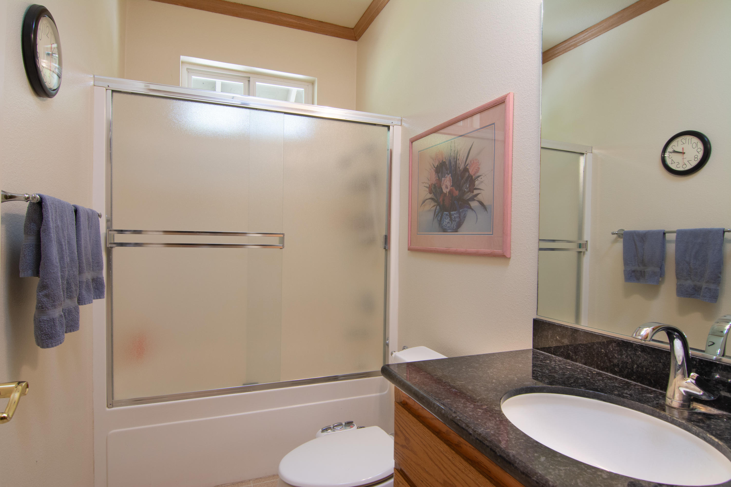 320 Salt Flat Road Lewiston, CA 96052 - Photo 30 of 32 a bathroom with a granite countertop sink toilet and shower