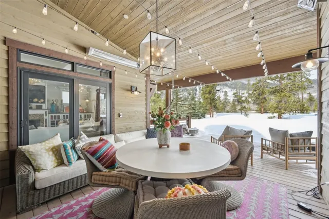 a white bath tub sitting next to a shower