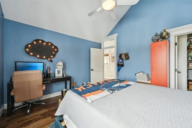 a living room filled with furniture and a large window