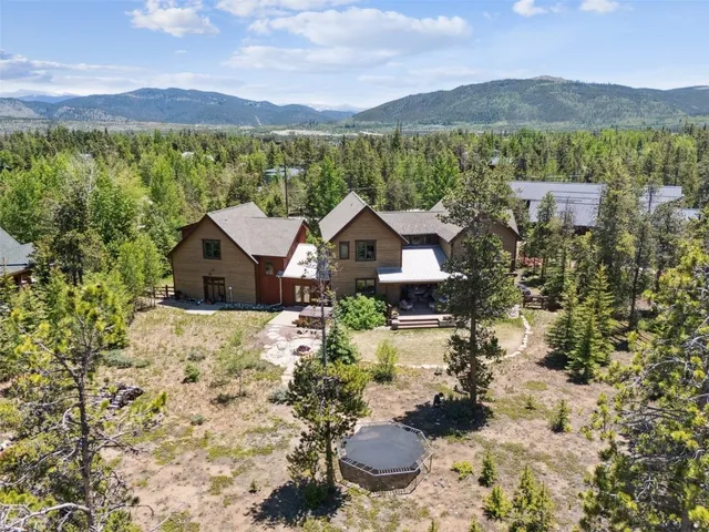 a view of a house with a fountain in patio
