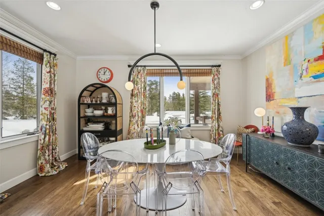 a bedroom with a bed dresser and a window