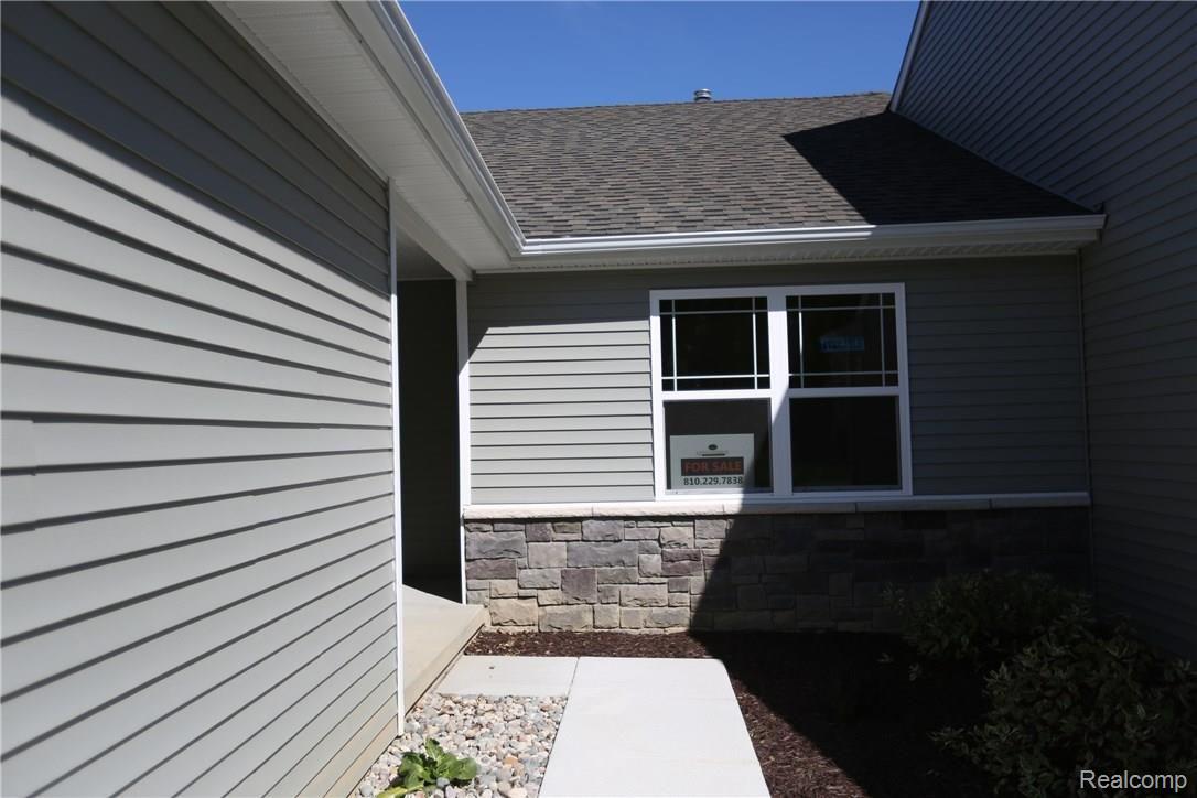 485 Hosta, Unit 86 Howell, MI 48843 - Photo 2 of 11 Please note, pictures are of a different condominium with identical floor plan!