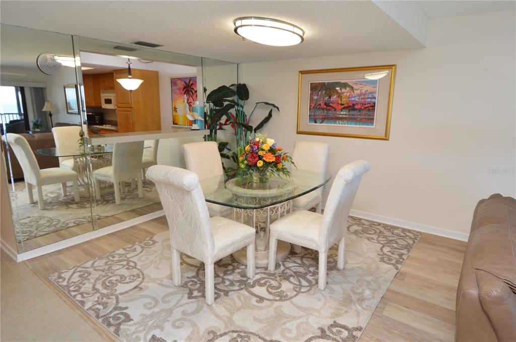 900 Gulf Boulevard, Unit 907 Indian Rocks Beach, FL 33785 - Photo 13 of 88 a view of a dining room with furniture