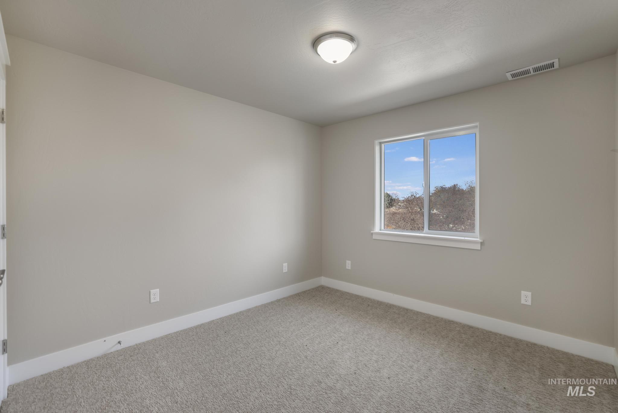 812 Jack Avenue Jerome, ID 83338 - Photo 23 of 38 Empty room with baseboards and carpet