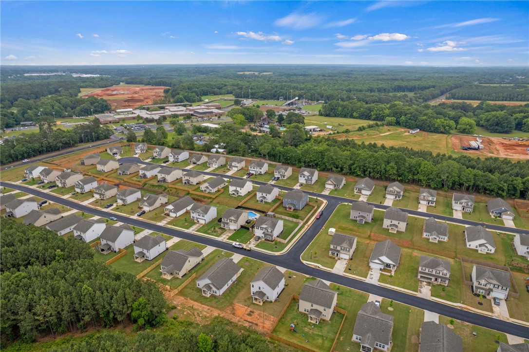 122 Bellflower Lane Anderson, SC 29625 - Photo 14 of 15 An aerial view of a vibrant residential neighborhood nestled amidst lush green surroundings.