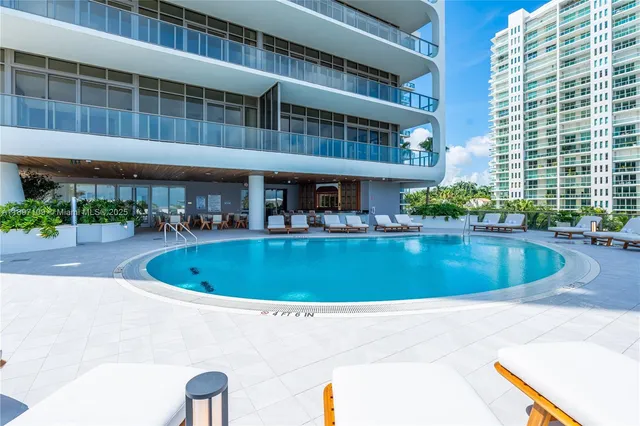 a view of a lobby with black carpet