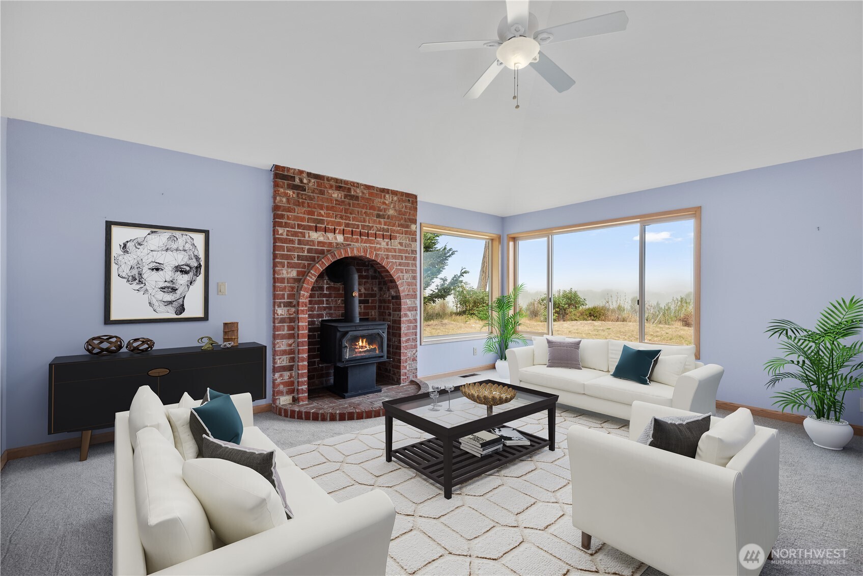 860 Hunt Road Port Angeles, WA 98363 - Photo 11 of 40 a living room with furniture and a fireplace