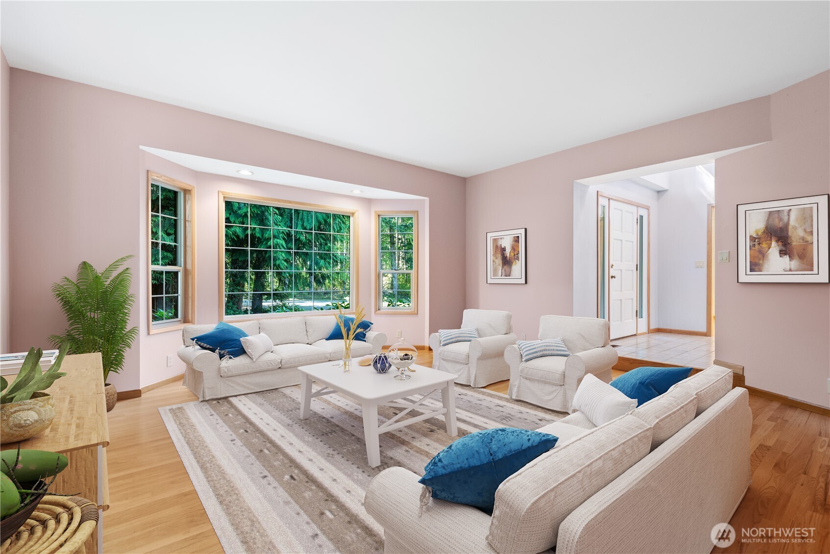 860 Hunt Road Port Angeles, WA 98363 - Photo 14 of 40 a living room with furniture and large windows
