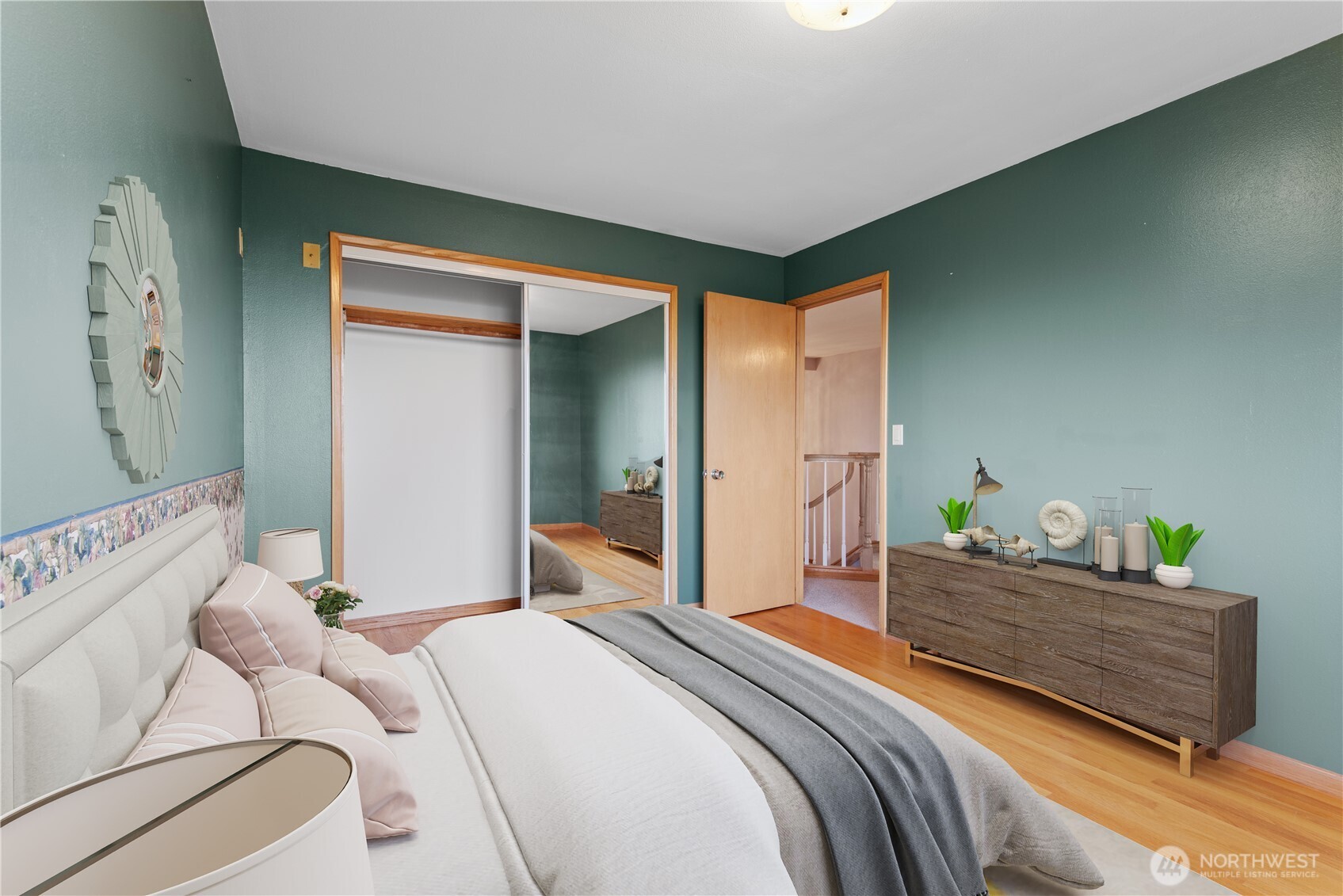 860 Hunt Road Port Angeles, WA 98363 - Photo 17 of 40 a bedroom with a bed and wooden floor